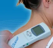 Woman receiving SCENAR device treatment on her neck and shoulder