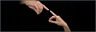 Two hands reaching toward each other, Orange County pain relief doctor